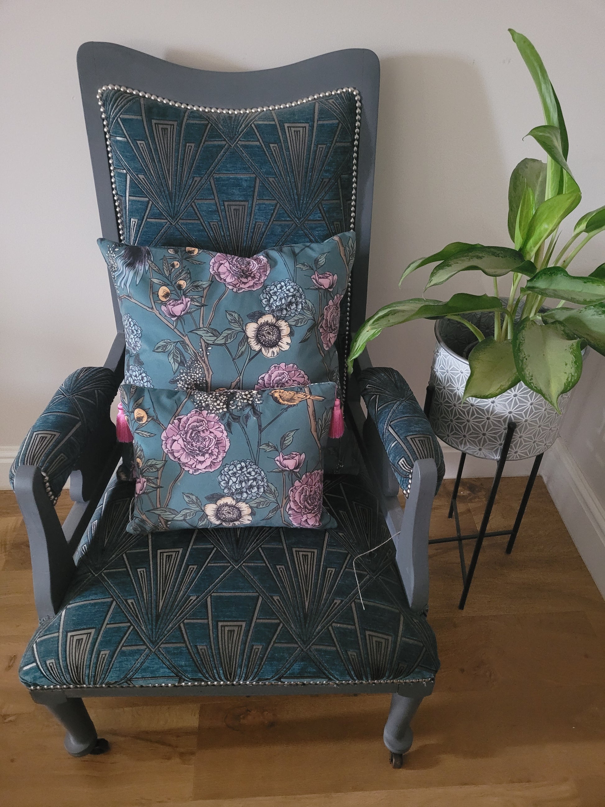 Teal rectangular cushion with bird and floral print and pink tassels; handmade scatter pillow.