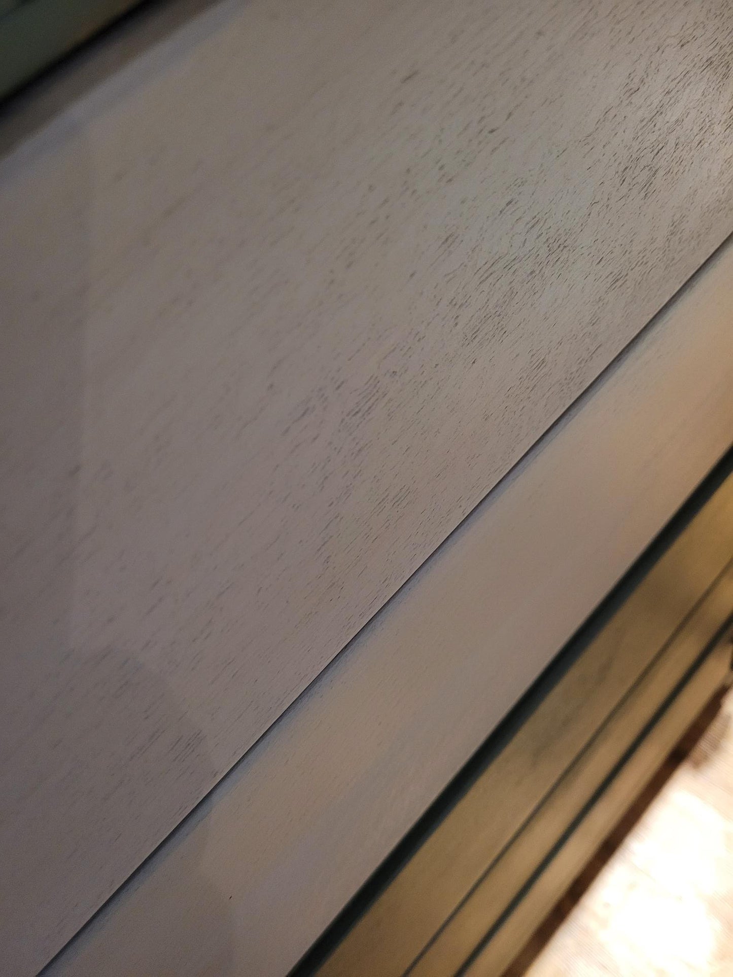 Lebus chest of drawers painted Bayberry with Algonquin wash and black scarab handles; five drawers with floral liners..