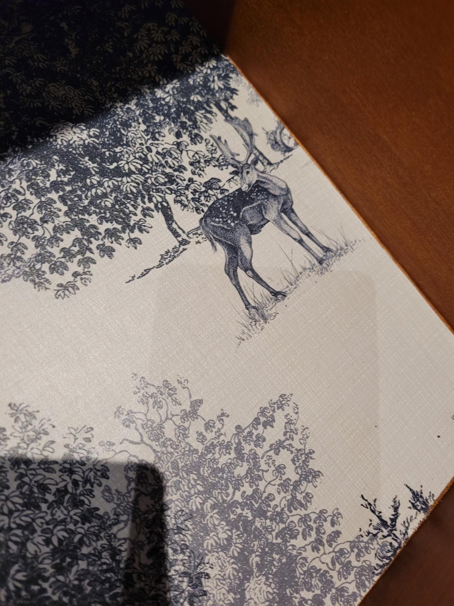 Pair of Stag Minstrel Letterbox Bedsides, featuring a French Parisien 'Toile de Jouy' design in cream and blue. These elegant bedside tables add a touch of vintage charm to any bedroom. Perfect for those who appreciate classic and timeless bedroom furniture.