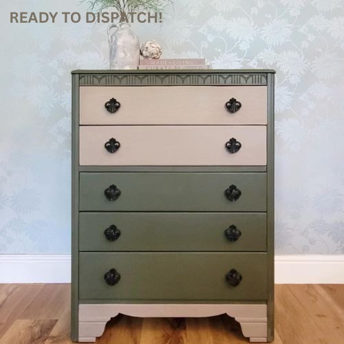 Lebus chest of drawers painted Bayberry with Algonquin wash and black scarab handles; five drawers with floral liners.