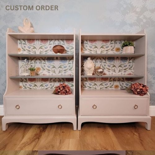 Custom Order - Beautifully upcycled green bookshelf with floral wallpaper backing. The shelves display decorative items and the bottom drawer features elegant gold ring pulls. Perfect for adding a touch of nature-inspired charm to any living room, bedroom, or hallway.