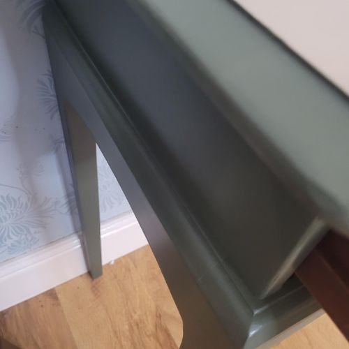 Hand-painted Stag Minstrel console table in olive and taupe with drawer.