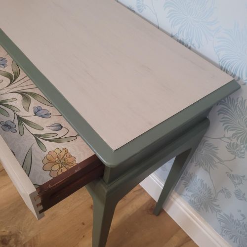 Hand-painted Stag Minstrel console table in olive and taupe with drawer.