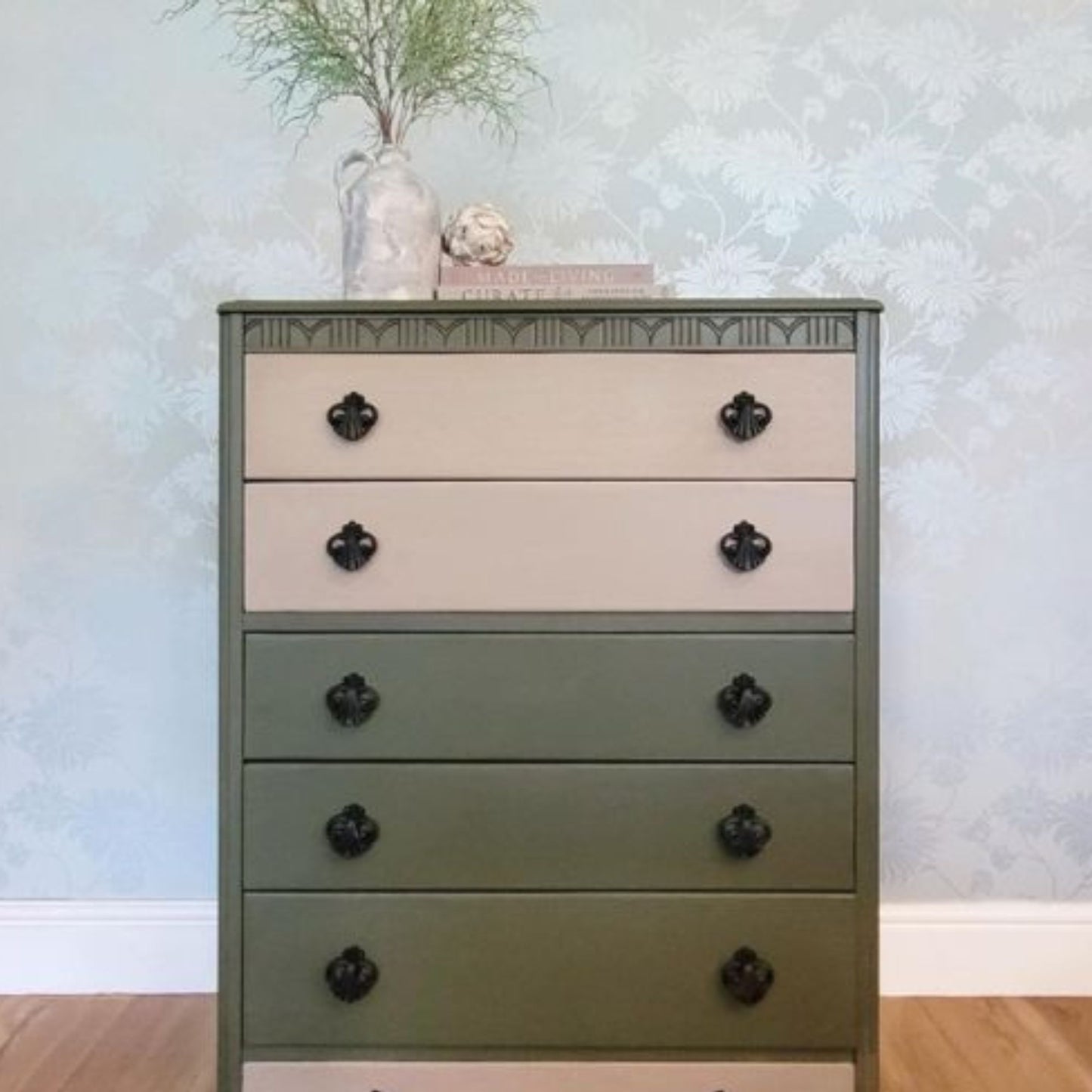 Lebus chest of drawers painted Bayberry with Algonquin wash and black scarab handles; five drawers with floral liners.