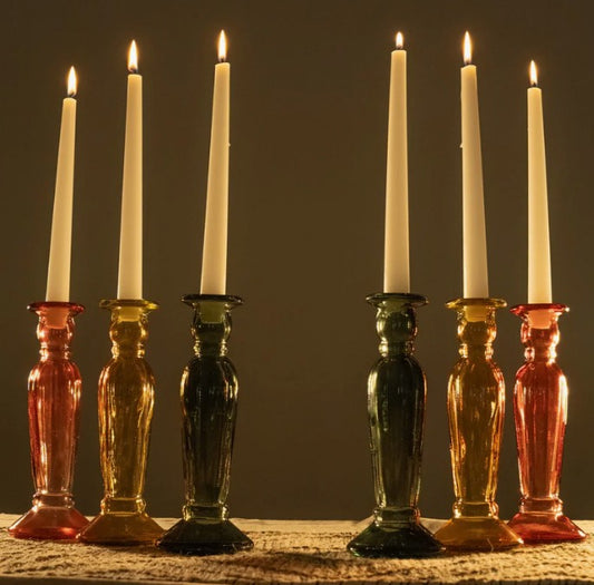 Add warmth and elegance to your space with our best-selling fluted dinner candleholder, now available in a rich burnt orange hue.
Expertly crafted from 100% recycled glass, this striking piece blends sustainable living with timeless style, making it an ideal choice for both everyday moments and special occasions