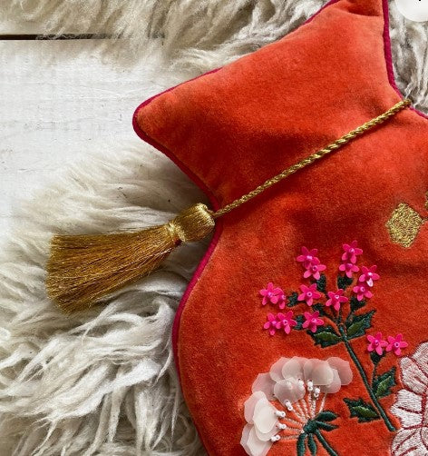 Posy orange velvet embroidered hot water bottle with beads, gold tassel and hot-pink reverse, 800ml