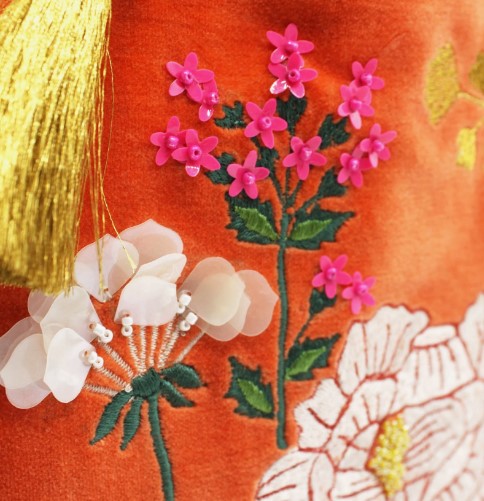 Posy orange velvet embroidered hot water bottle with beads, gold tassel and hot-pink reverse, 800ml