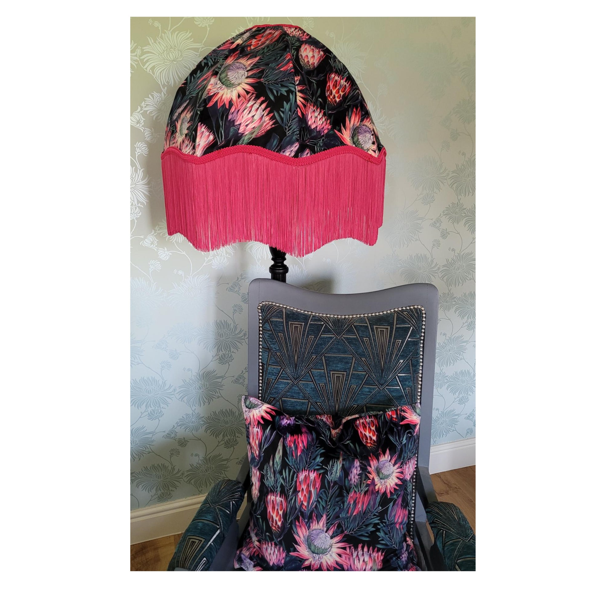 Handmade protea floral velvet cushion, 45cm scatter pillow in coral, pink, and navy with feather inner.