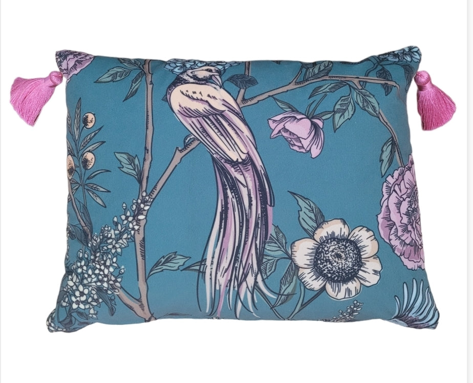 Teal rectangular cushion with bird and floral print and pink tassels; handmade scatter pillow.