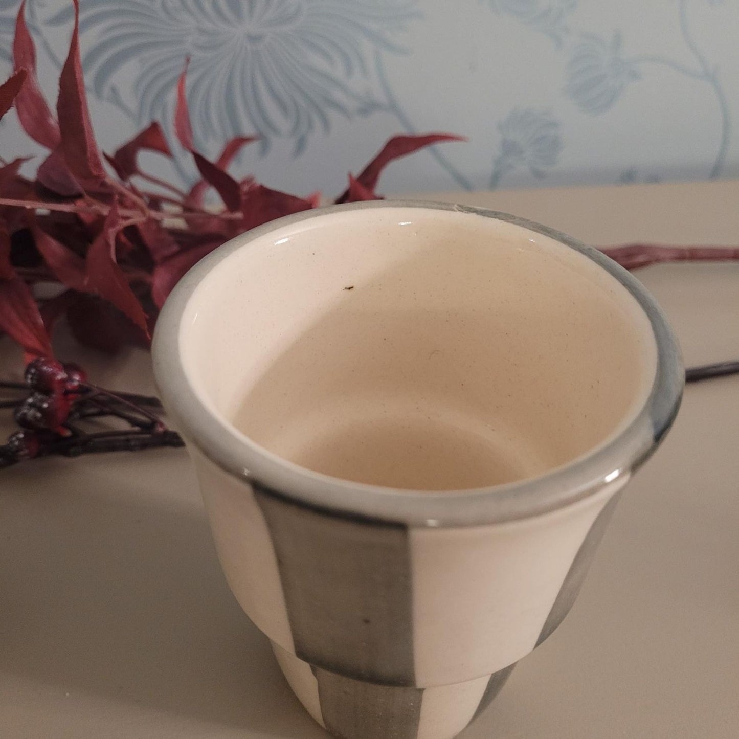 Stoneware handleless coffee beaker with green and cream Scandi stripes, 180ml.