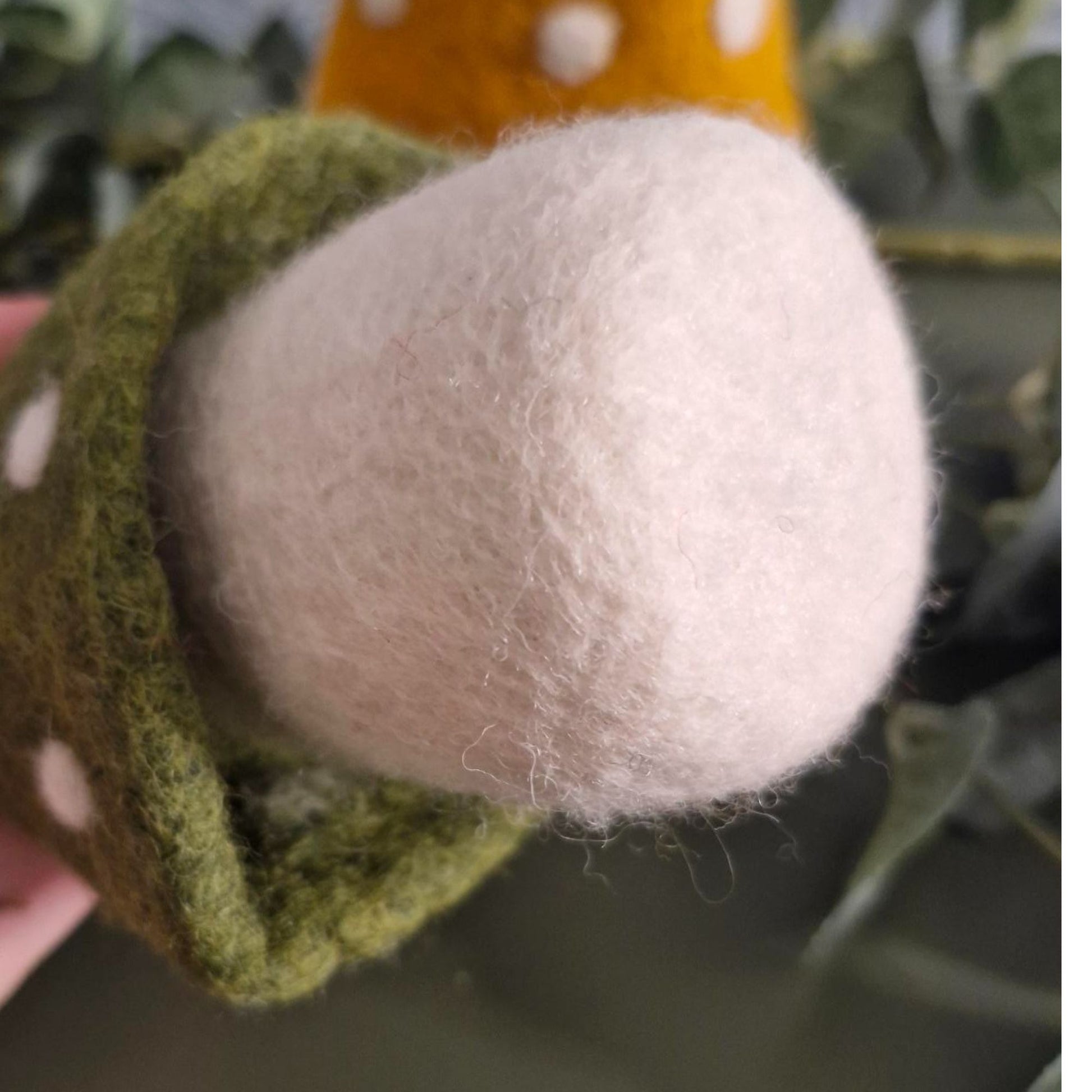 Handcrafted felt mushroom ornament, 19cm, 100% wool with white polka-dot cap; made in Nepal.