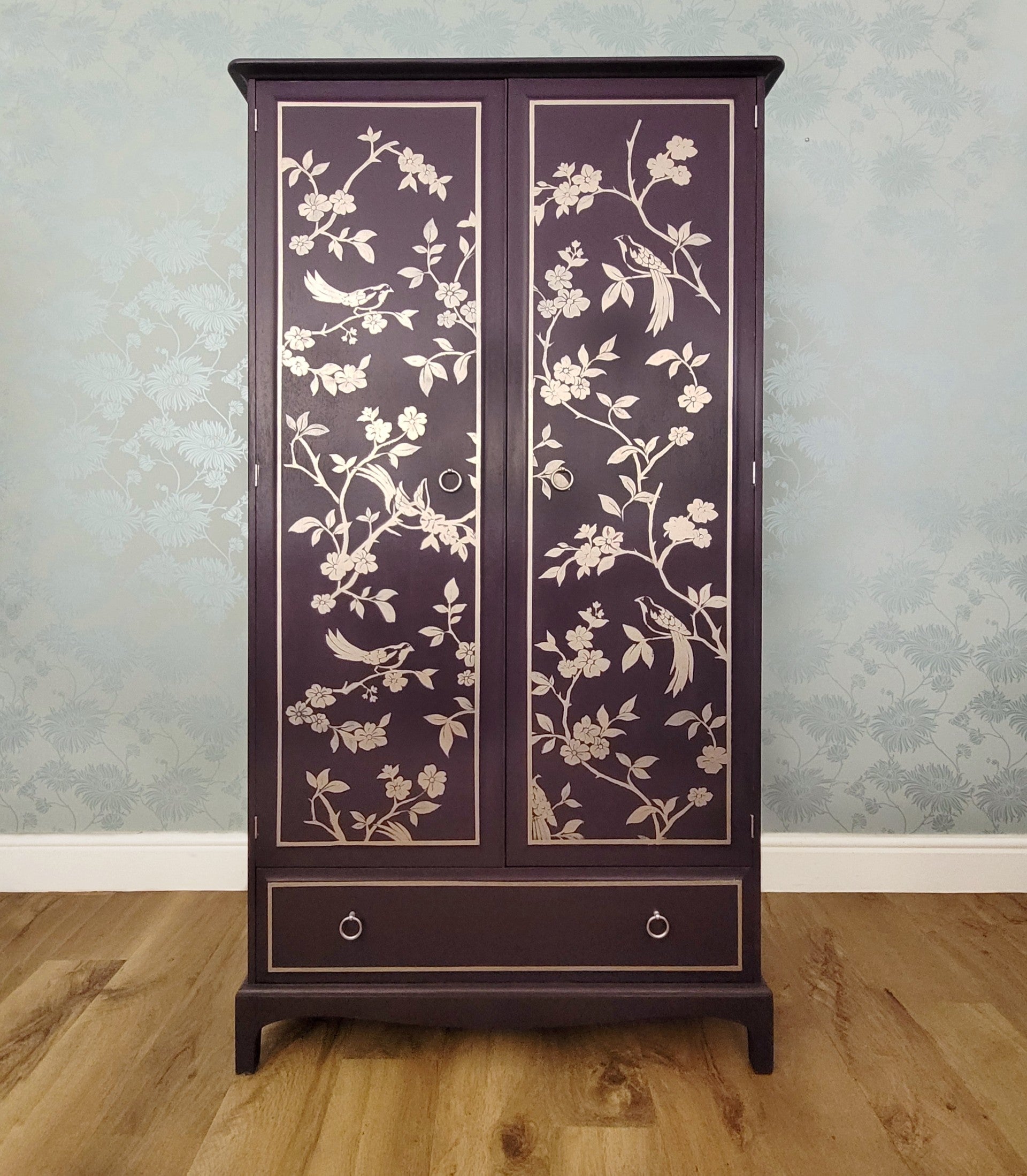 Front view of custom hand-painted Stag Minstrel double wardrobe in Fusion Mineral Paint Velvet Plum with gold chinoiserie design - available for commission as a bespoke hand painted order