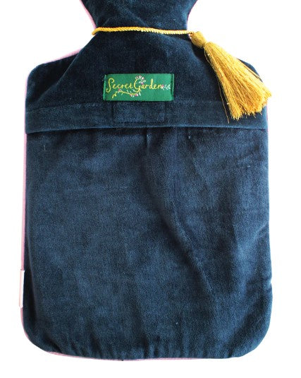 Dark blue velvet hot water bottle cover with embroidered swallows, gold stitching, pink piping and tassel