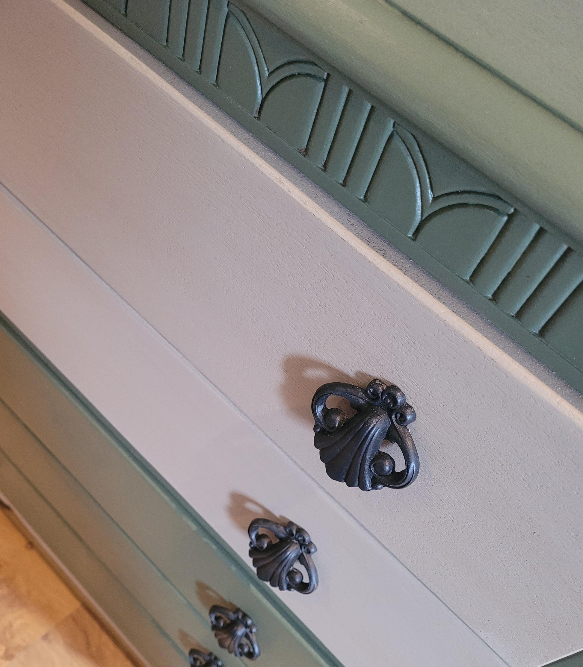 Upcycled Mid-Century 5-Drawer Chest by Lebus, painted in Bayberry with Algonquin Wash on top drawers. Lined with Tulip Garden wallpaper and featuring black scarab hardware.