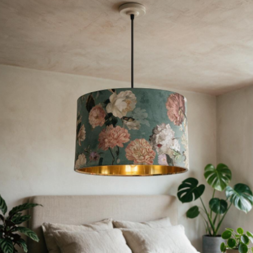 Velvet botanical lampshade hung in a bedroom decorated in a neutral colour scheme