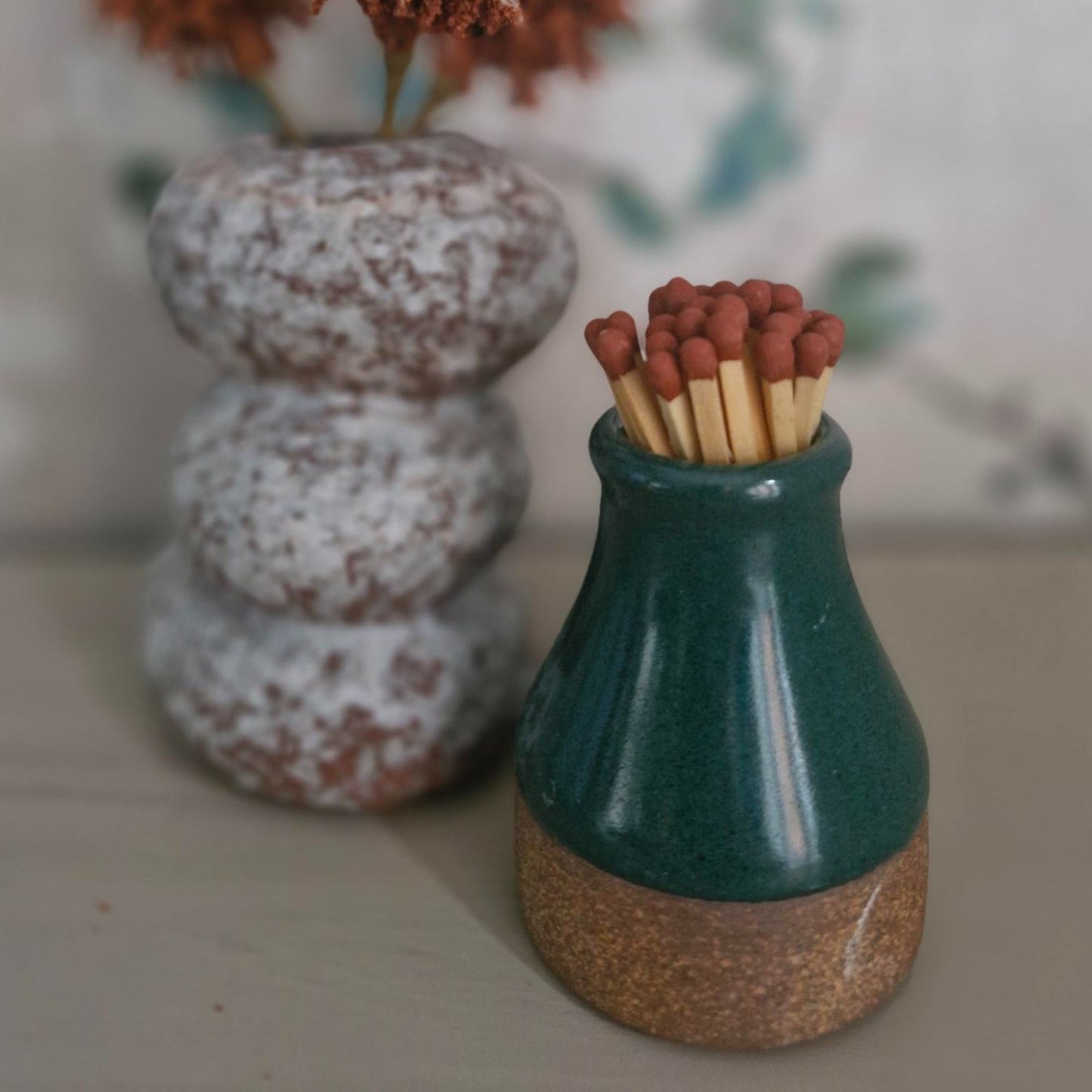 Glazed ceramic match striker pot in forest green colourway