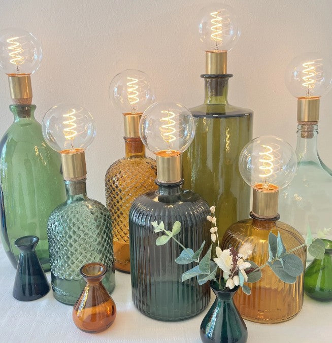 Handblown bubble vase in 100% recycled glass. A rustic statement piece that catches the light beautifully. 20cm tall. Light Green, Dark Green or Navy.