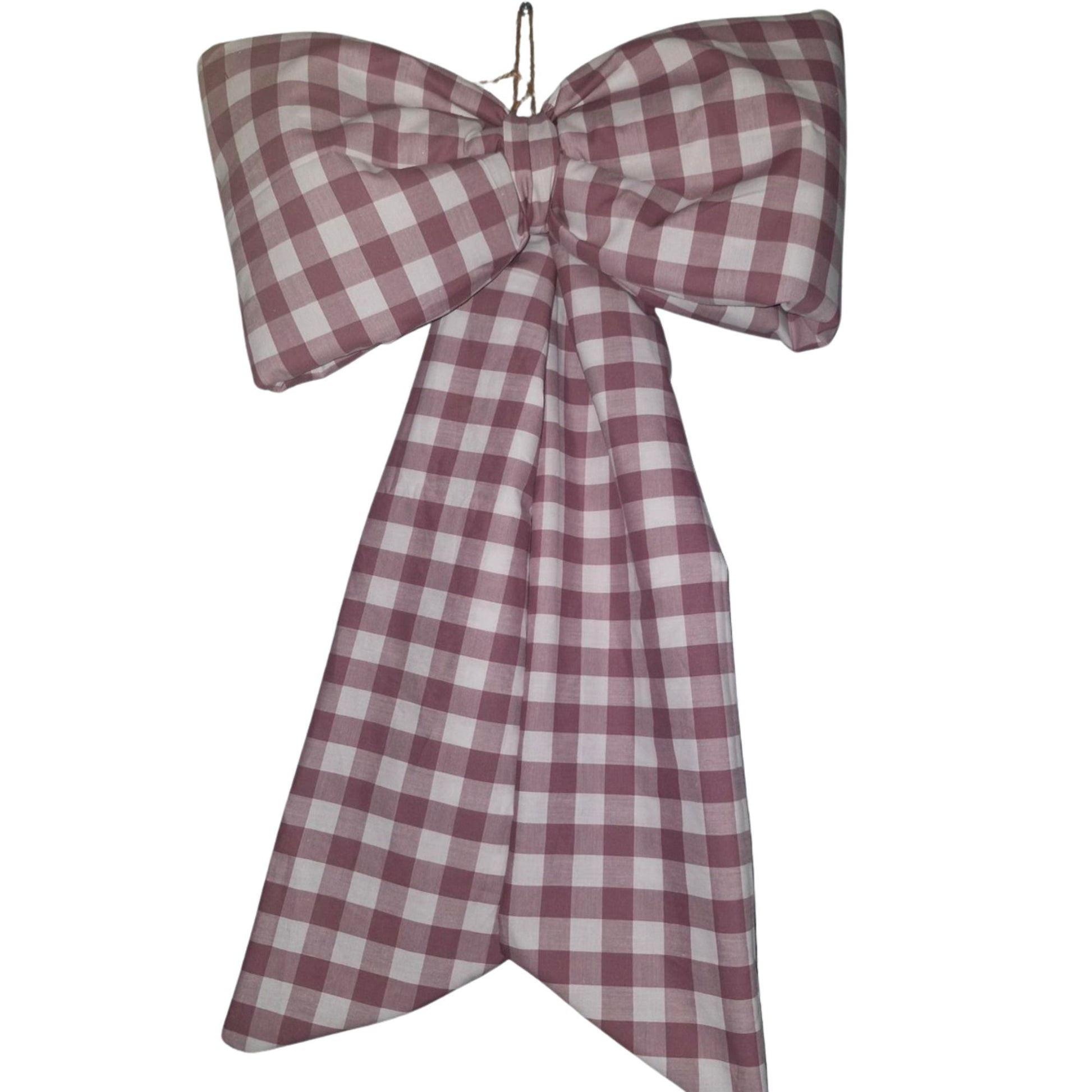 Large checkered bow with a purple and white pattern on a white background