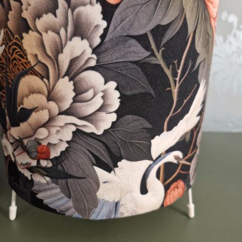 Image of base feel of floor lampshade against the velvet botanical fabric