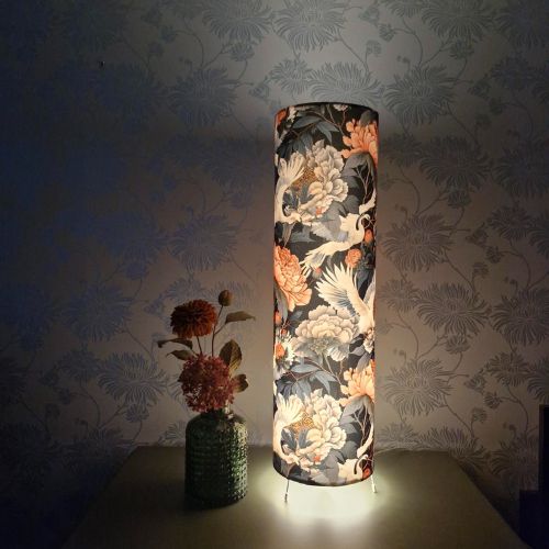 floor lamp lit up to show soft ambient glow