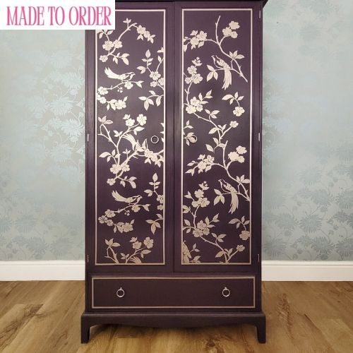 Front view of custom hand-painted Stag Minstrel double wardrobe in Fusion Mineral Paint Velvet Plum with gold chinoiserie design