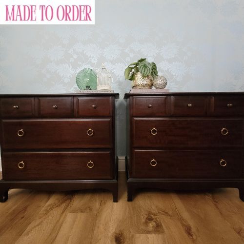 Pair of Stag Minstrel oversized bedside tables with classic design and brass ring handles. Painted to order in a colour and design of your choosing. Stag Minstrel bedside tables offering versatile storage with timeless design with three spacious drawers.
