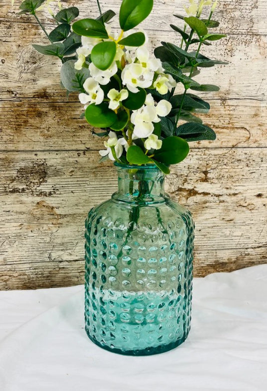 Handblown bubble vase in 100% recycled glass. A rustic statement piece that catches the light beautifully. 20cm tall. Light Green, Dark Green or Navy.