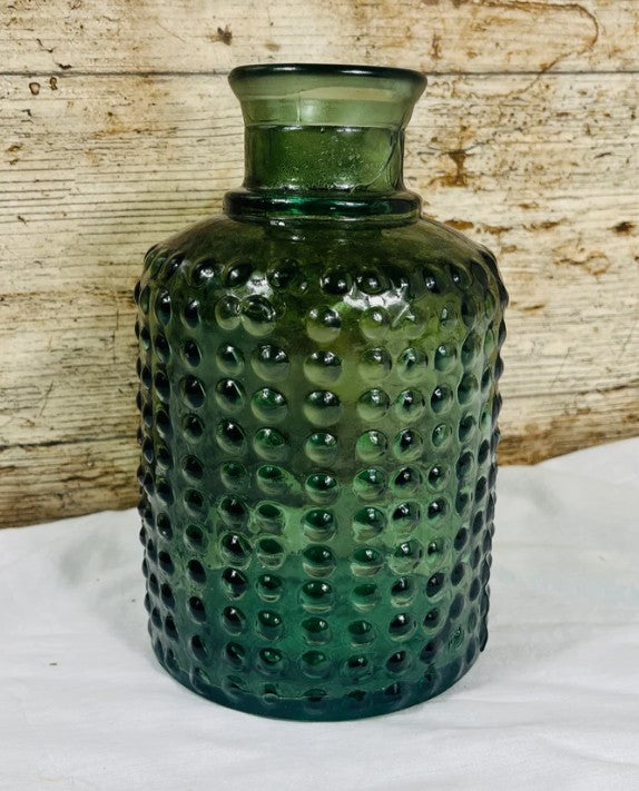 Handblown bubble vase in 100% recycled glass. A rustic statement piece that catches the light beautifully. 20cm tall. Light Green, Dark Green or Navy.