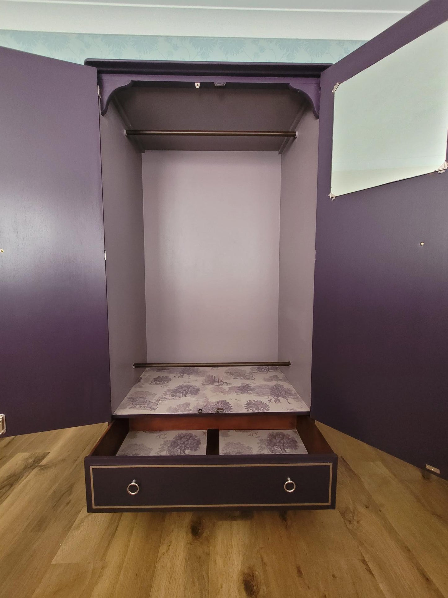 Interior of Stag Minstrel wardrobe painted in Lavender Haze with lavender toile decoupage lining